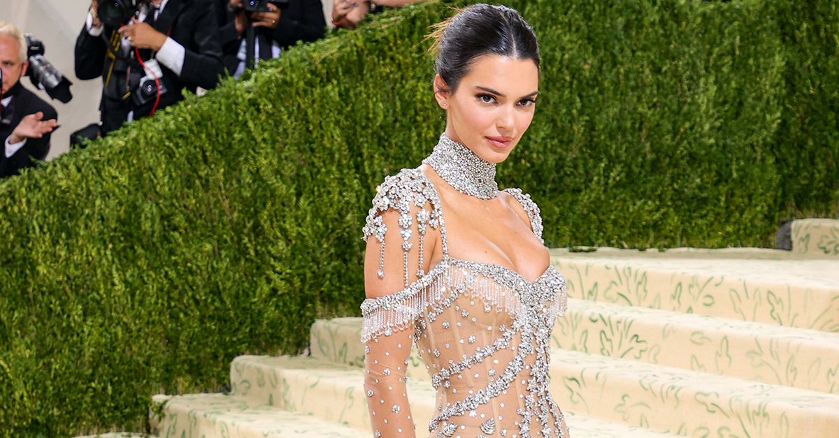 kendall jenner silver dress met gala Kendall Jenner Shines in Silver Versace SS20 , Kendall lights up the runway in a dazzling silver mini dress at Milan Fashion Week. Clean lines, bold attitude, and timeless Versace glamour. The