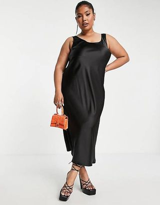 Asos Design + Curve Scoop Neck Midi Satin Slip Dress in Black