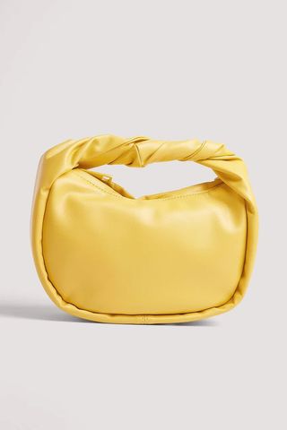 NA-KD Accessories + Twisted Rounded Mini Handbag