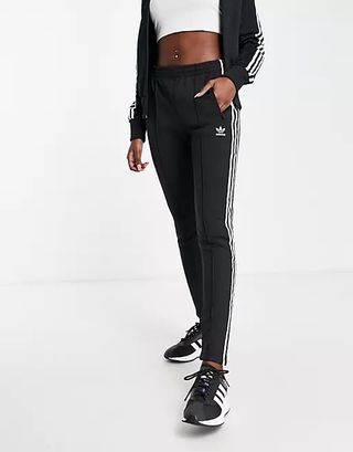Adidas Originals + Adicolor Three Stripe Cuffed Joggers in Black