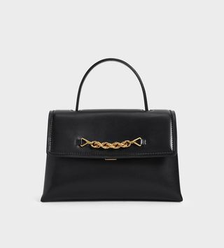 Charles & Keith + Black Chain-Embellished Trapeze Top Handle Bag