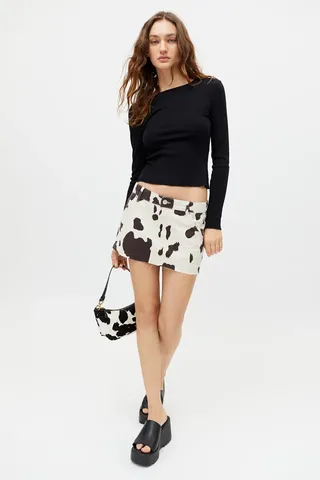 Urban Outfitters + Cow Print Denim Mini Skirt