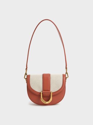 Charles & Keith + Brick Mini Gabine Two-Tone Saddle Bag​