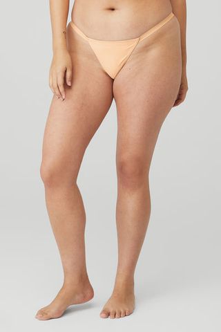 Alo Yoga + Airbrush Invisible String Thong in Champagne