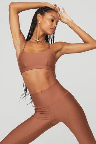 Alo Yoga + Airlift Intrigue Bra in Rust