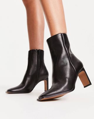 ASOS Design + Remmy Set-Back Heeled Boots in Black