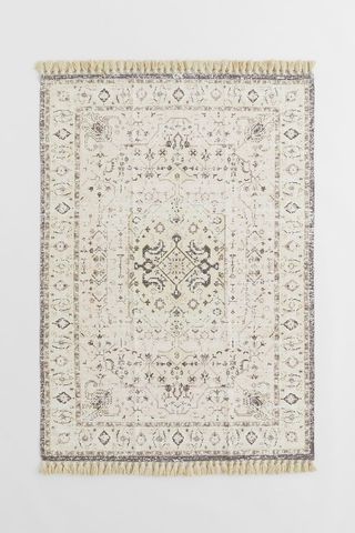 H&M + Patterned Rug With Tassels