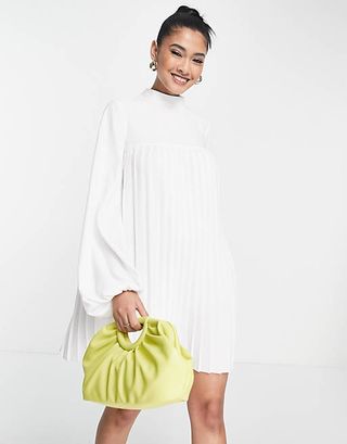 ASOS Design + High Neck Pleated Trapeze Mini Dress in Ivory