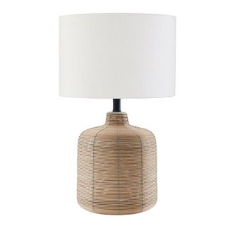 Evelyn 
Zoe + Modern Petite Rattan Table Lamp With Blackened Steel Accents