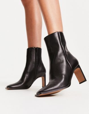 ASOS DESIGN + Remmy Set-Back Heeled Boots in Black