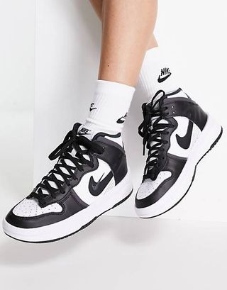 Nike + Dunk High Rebel Trainers in White and Black