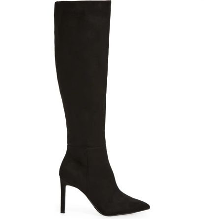 EmRata Wore a $40 Zara Skort With Popular Knee-High Boots | Who What Wear