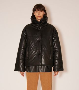 Nanushka + Hide Okobor Alt-Leather Puffer Jacket in Black