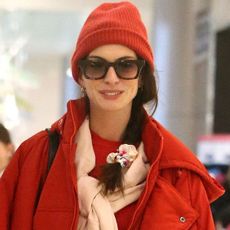 anne-hathaway-airport-red-coat-305126-1674677498033-square