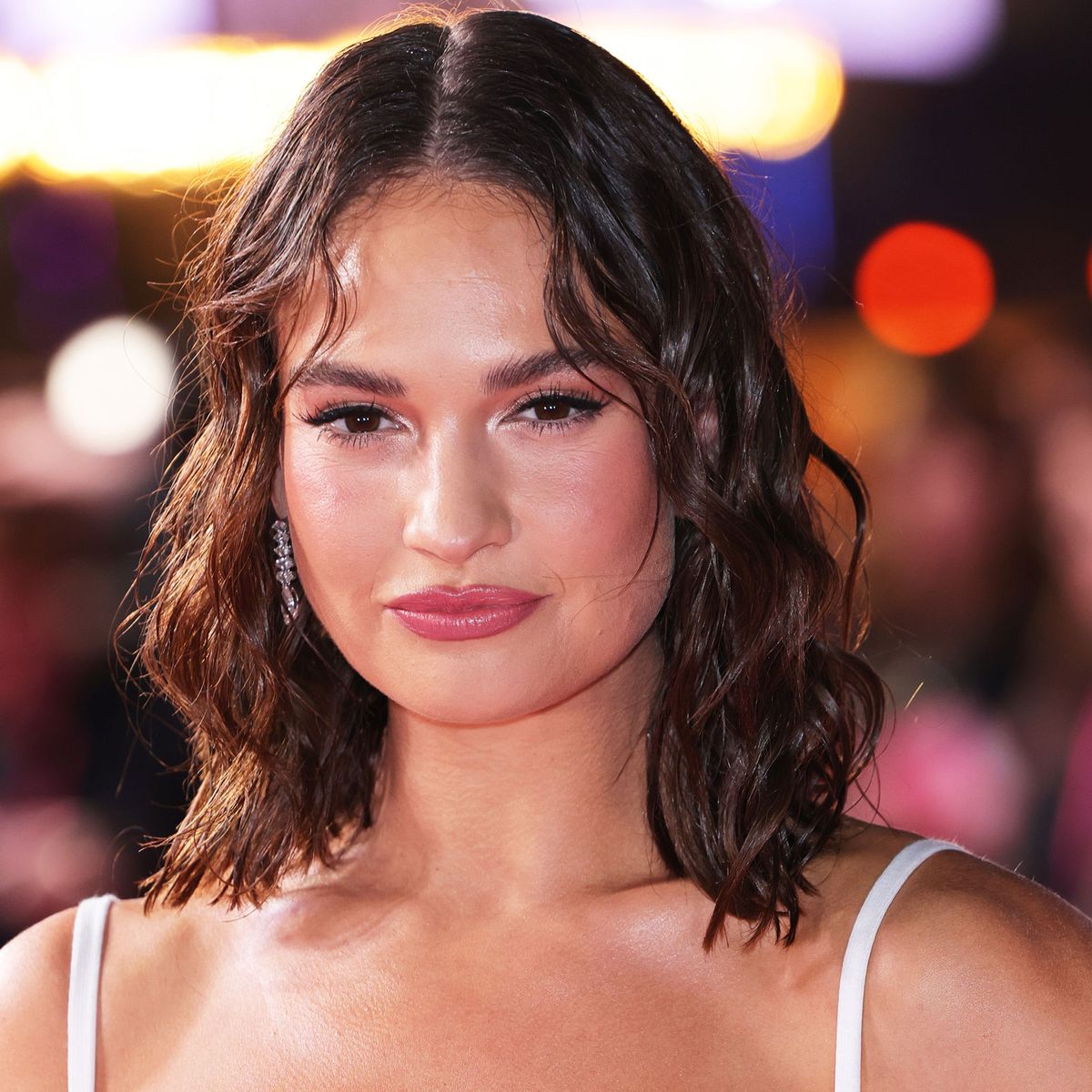 Lily James takes the shocking visible bra trend to the red carpet