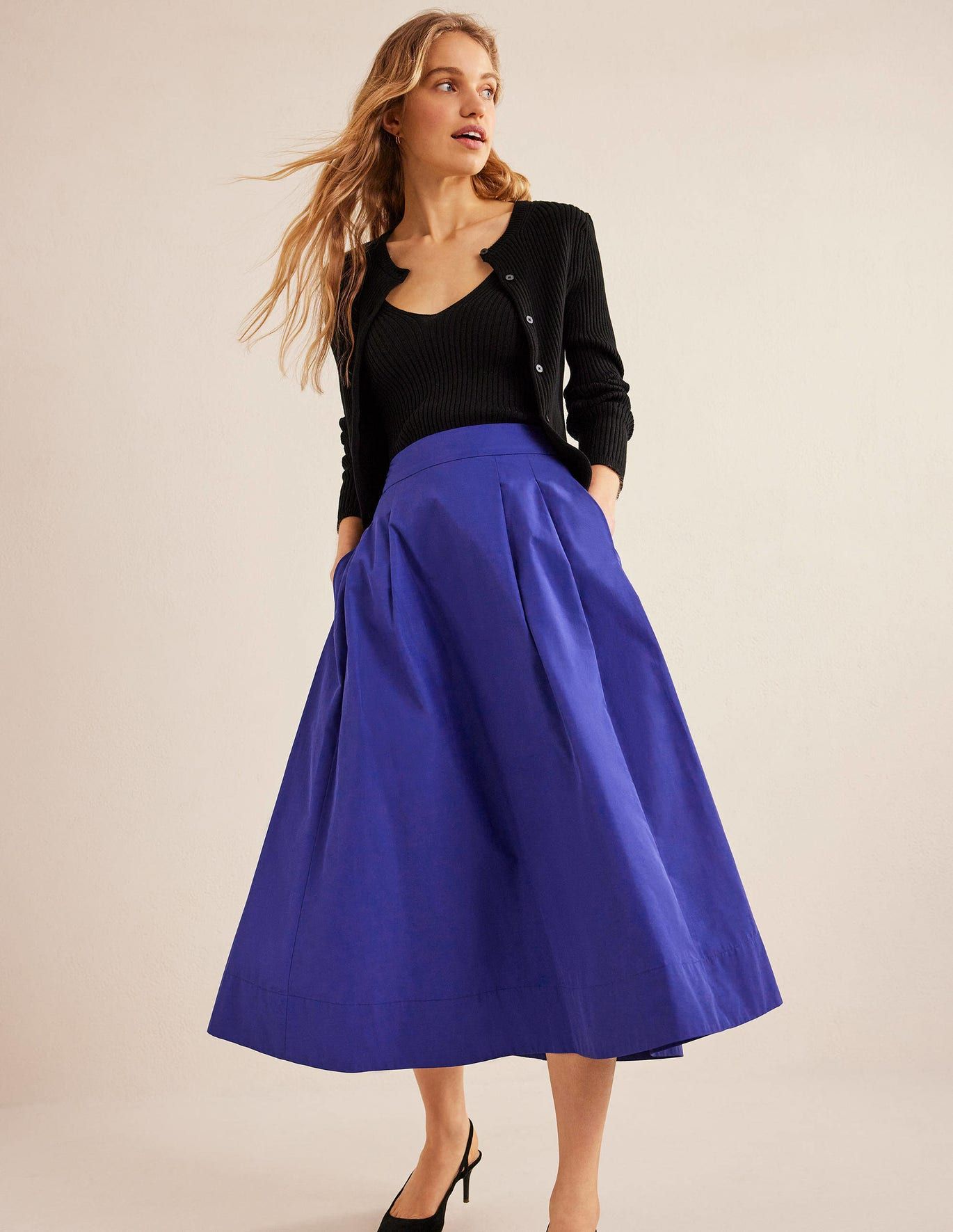 30 Pretty Midi Skirts Seen All Over New York Fashion Week | Who What Wear