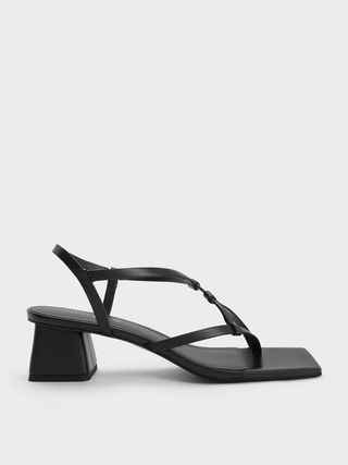 Charles 
Keith + Black Asymmetric Interwoven Thong Sandals