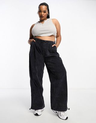ASOS Design + Cord Parachute Cargo Pants in Washed Black