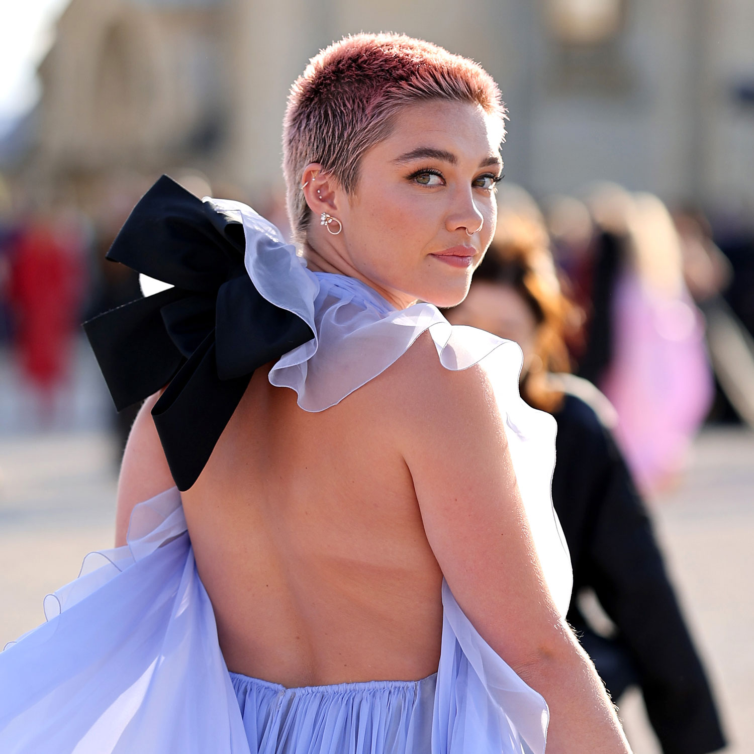 Florence Pugh Wears a Sheer Crop Top at Paris Fashion Week