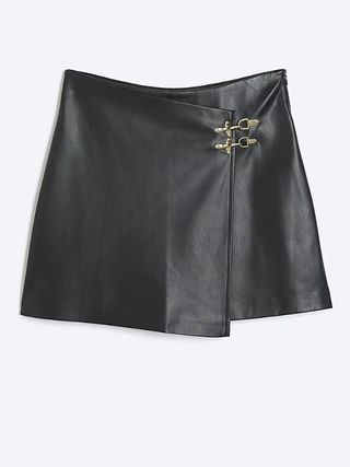 River Island + Black Faux Leather Buckle Wrap Mini Skirt