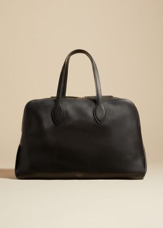 Khaite + The Large Maeve Weekender Bag in Black Pebbled Leather