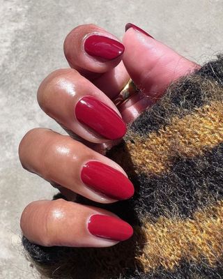 red-nail-polish-trend-309783-1696248340052-main