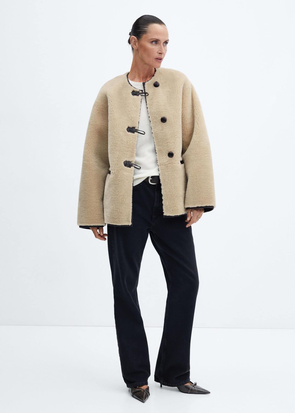 FYI: The TikTok-Viral Mango Shearling Coat Is Back in Stock | Who What Wear