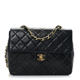 Chanel + Lambskin Quilted Mini Square Flap Bag in Black