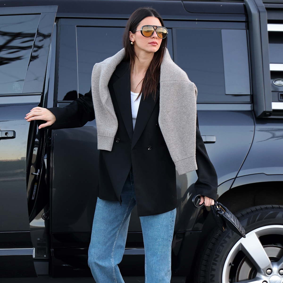 Kendall Jenner Made a Hooded Sweatshirt Totally Chic  Leather jacket  outfits, Jacket outfits, Street style