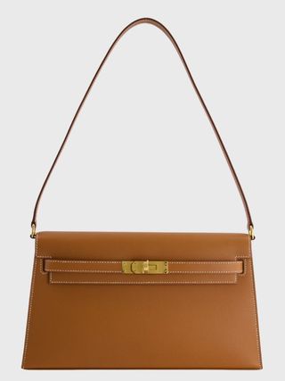 Hermès + Kelly Elan Bag in Gold Madame Leather With Gold Hardware