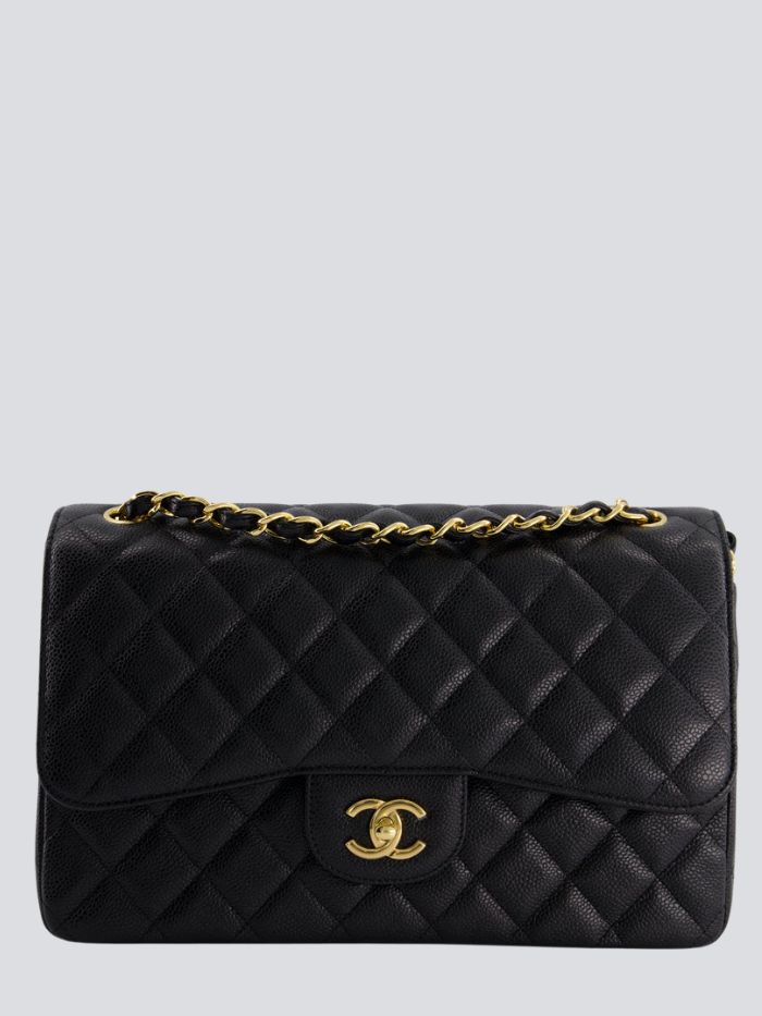 Chanel + Black Jumbo Classic Double Flap Bag in Caviar Leather With Gold Hardware