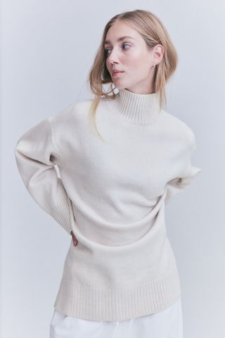 H&M + Mama Turtleneck Sweater