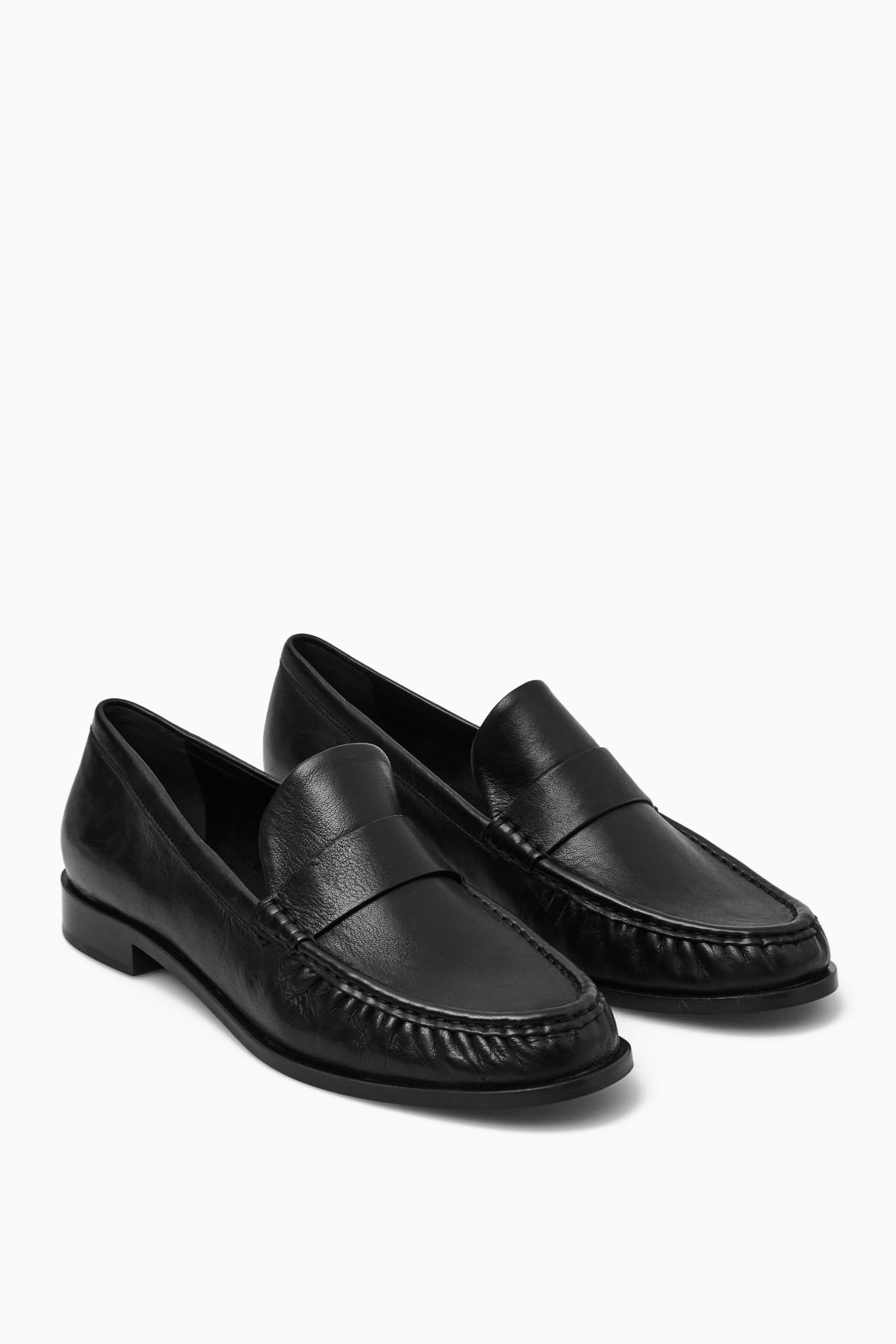 COS + Leather-essentially based mostly Loafers