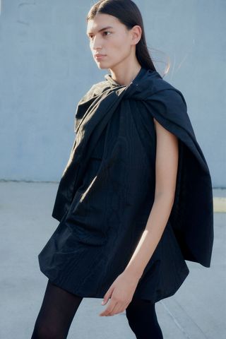 Marina Moscone + Twist Capelet