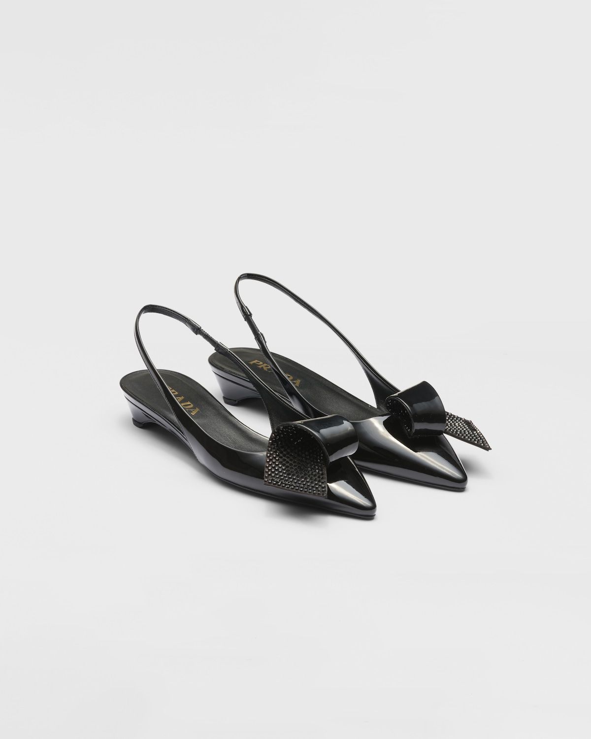Prada + Patent Leather Slingback Pumps