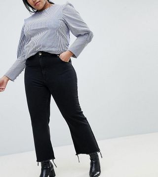 ASOS Curve + Egerton Rigid Cropped Flare Jeans in Washed Black With Raw Hem