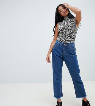 Missguided Petite + Wrath Mid Rise Cropped Flare Jeans in Mid Blue Wash