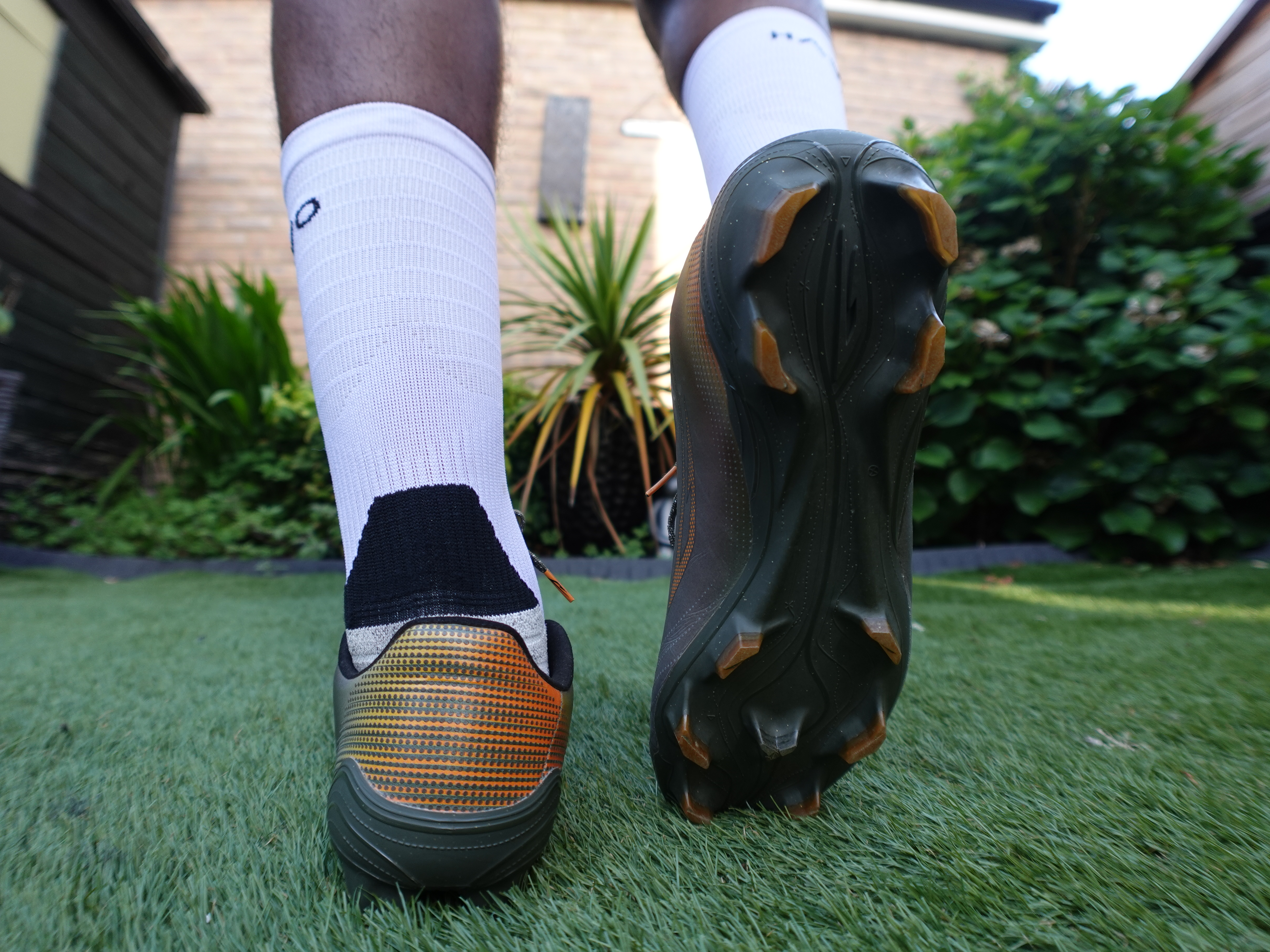 Sokito Scudetta Biotouch FG football boots photographed on astro turf
