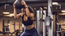 Beautiful hispanic female working out in the Gym