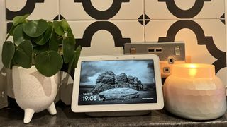 Google Nest Hub used as digital photo frame showing black and white landscape