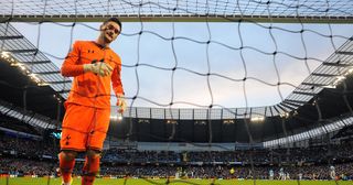 Tottenham Hotspur's French goalkeeper Hugo Lloris reacts after the sixth goal during the English Premier League football match between Manchester City and Tottenham Hotspur at The Etihad stadium in Manchester, north-west England on November 24, 2013. Manchester City won the match 6-0.