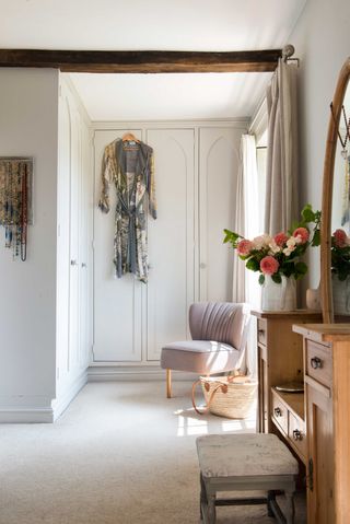 hallway to dressing room with wooden antique dressing table