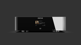 The Rotel Michi Q5 with album artwork on front panel on a grey background