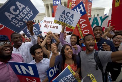 ObamaCare supporters cheer the ruling.