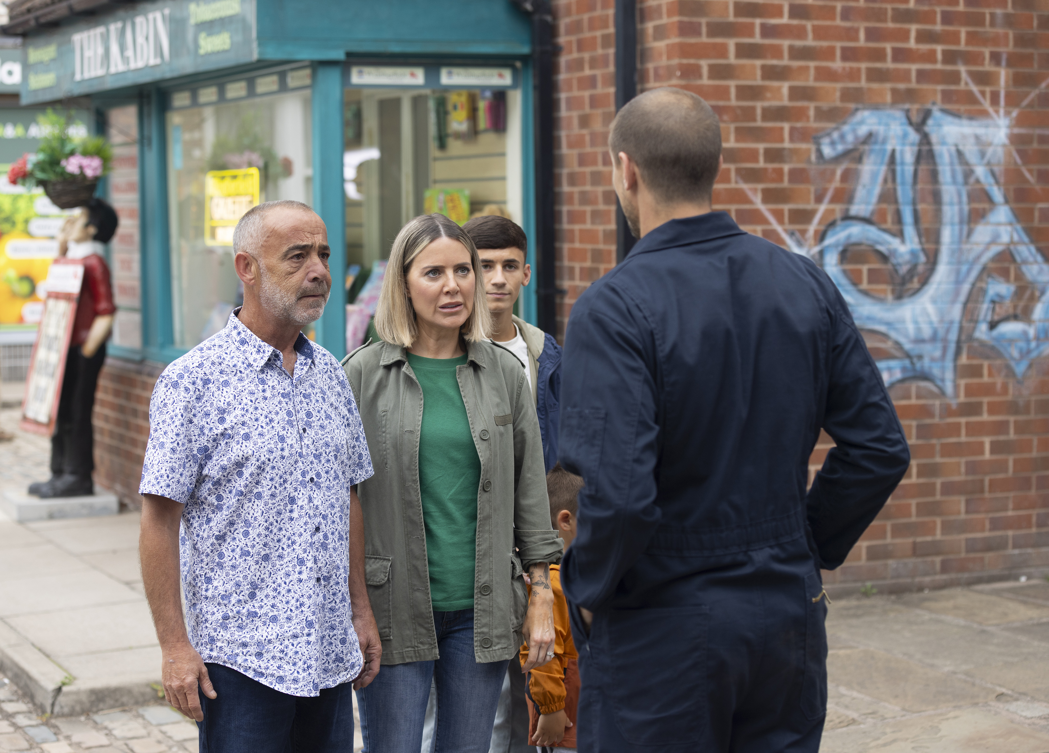 Kevin and Abi face up to Carl in Coronation Street