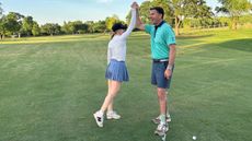 Lauren Katims with her husband on the golf course