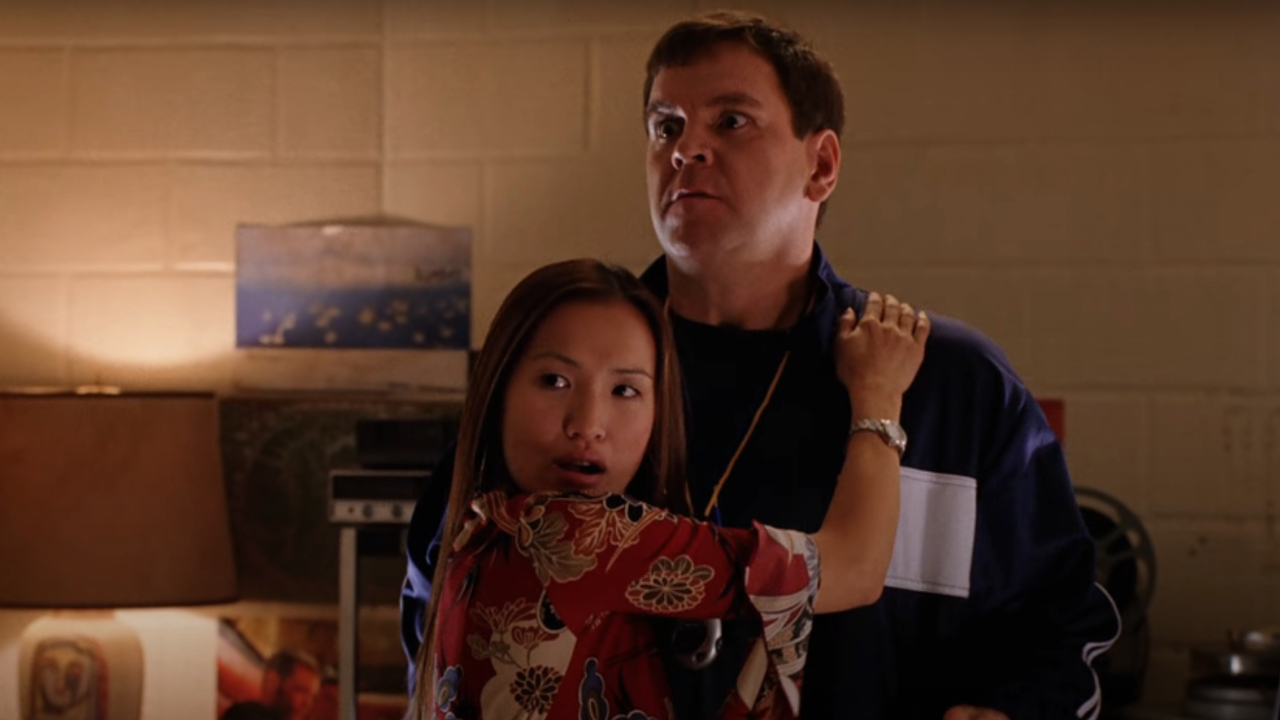 Dwayne Hill and Ky Pham caught in an embrace in Mean Girls.