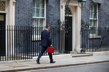 UK Chancellor Of The Exchequer Jeremy Hunt Presents Annual Budget