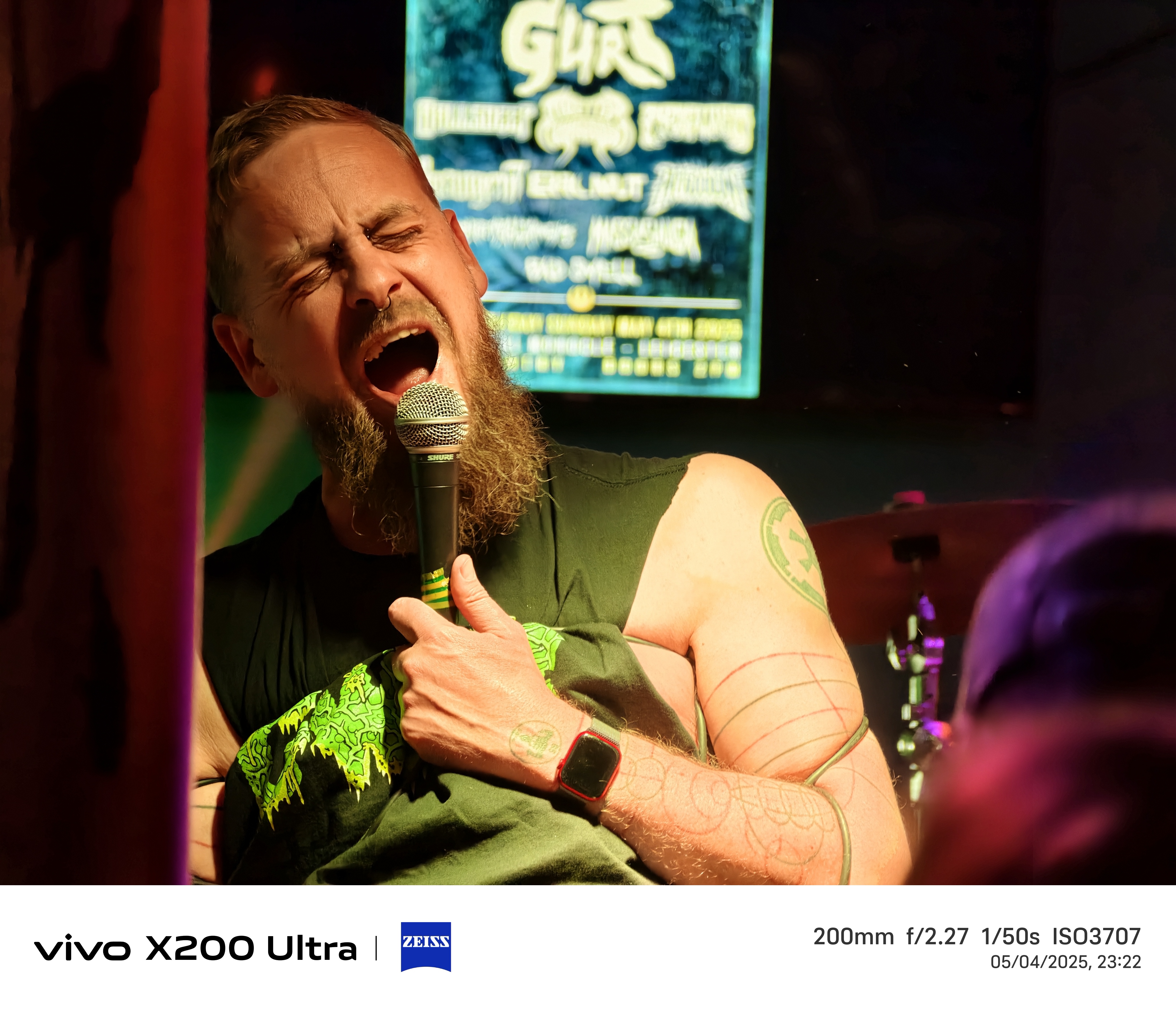Musician singing into a microphone shot on the Vivo X200 Ultra phone