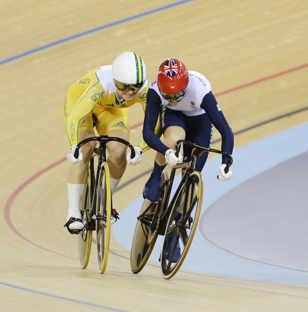 Anna Meares and Victoria Pendleton throw elbows. Pendleton comes out of the sprint lane,a move that gets her relegated.